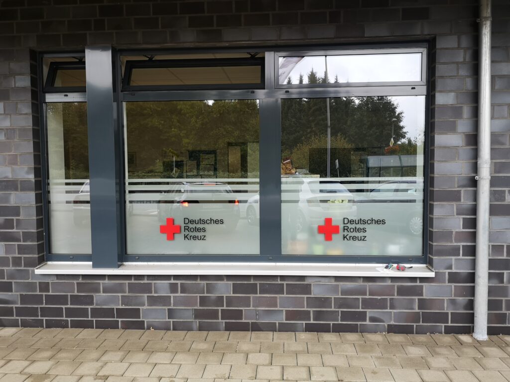 Schaufensterbeschriftung und Leuchtreklame Referenz